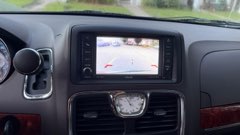 Touchscreen with backup camera and Chrysler clock